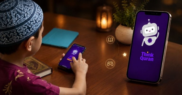 A young boy wearing a prayer cap uses a smartphone to run the Think Quran app, with a second phone showing the app’s logo on a stand nearby in a cozy room.