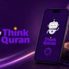 Think Quran branding with a friendly robot mascot, purple logo text, and a smartphone showing the app beside a Quran on a purple background.”